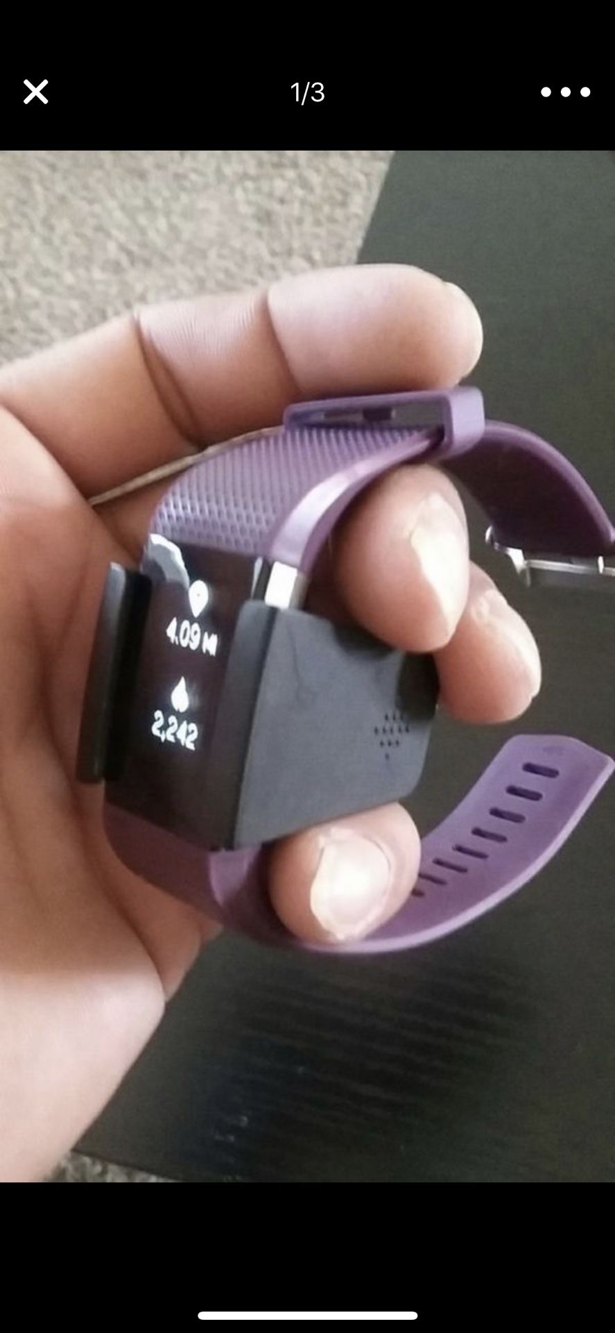 Purple Fitbit.