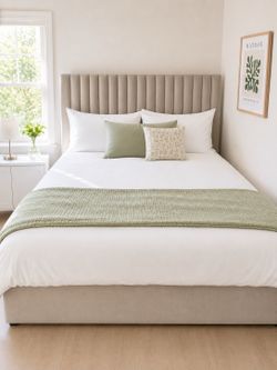 Queen size beige bed frame with headboard for sale.