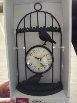 Bird cage clock