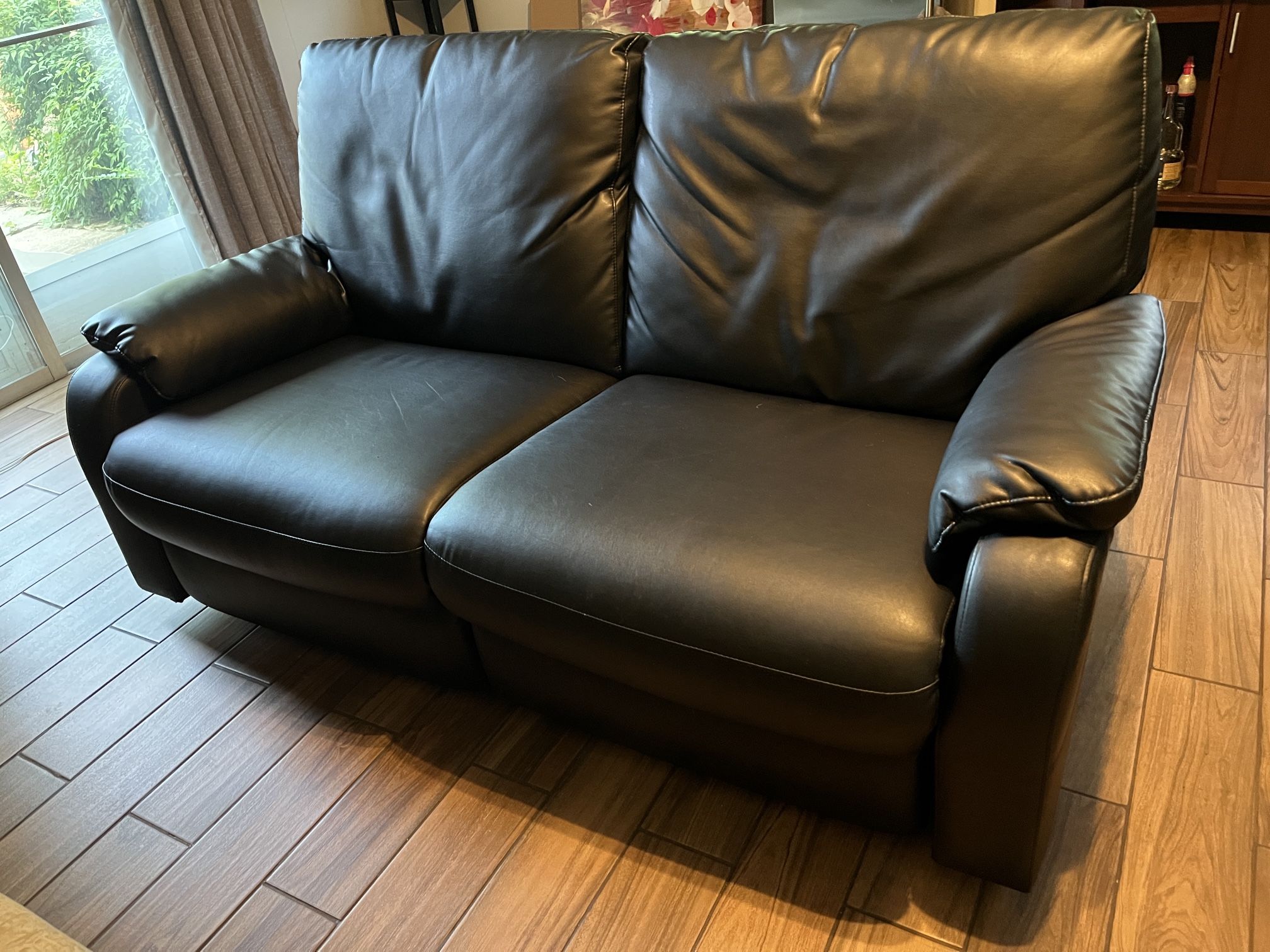 Power reclining sofa