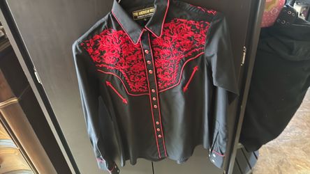 Tengo esta camisa vaquera.   Buena condición