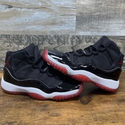 Size 4 Jordan Bred 11s
