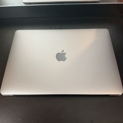 MacBook Air Retina 13-inch (2020) in excellent condition. 