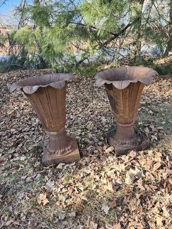 2 cast Iron urns  26" High  selling both for 675