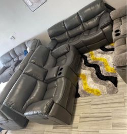 Fall clearance sale. Madrid, gray leather reclining sofa and loveseat set only $1099. Easy finance option. Same-day delivery.