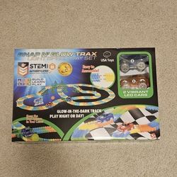 NEW IN BOX  Snap N' Glow Trax Light Speedway Set.
$32.