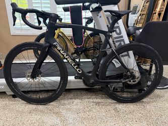 Pinarello Carbon Road Bike with Dura-Ace Wheels