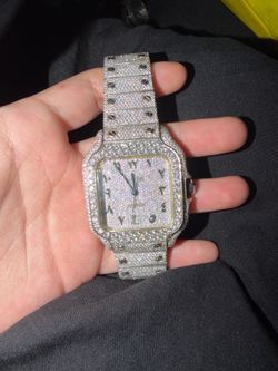 Iced-out Cartier with Arabic dial
