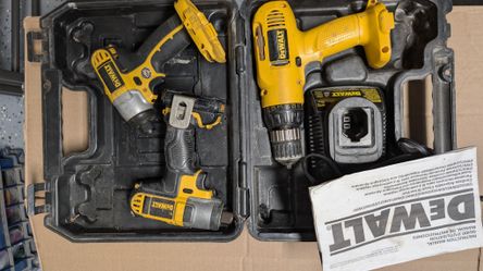 2 DeWalt Impact Drivers and 1 DeWalt Drill