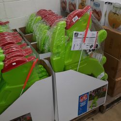 School. Kids Playing Signs To Slow Traffic