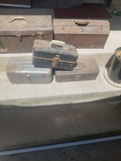 Old metal tackle boxes in and tool boxes $30