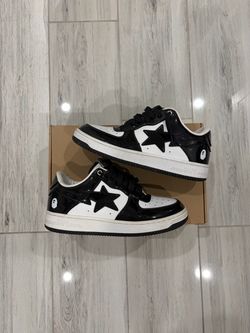 BAPE black and white sneakers with black star on white panel