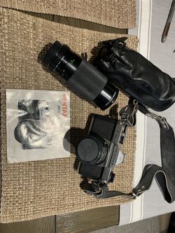 Pentax k1000 + additional zoom lens