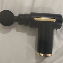 Massage gun 6 great mode fast charging soft massage great quality gold and black easy charging.