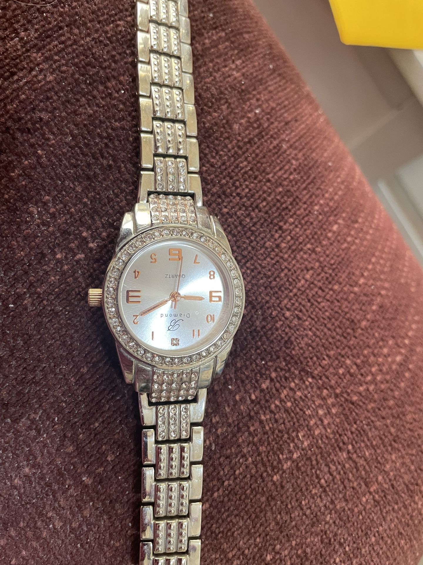 Women’s Burgie dress watch silver tone round face with CZ’s bracelet band quartz movement