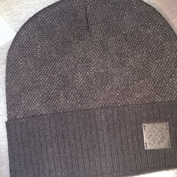 grey and black Louis Vuitton hats