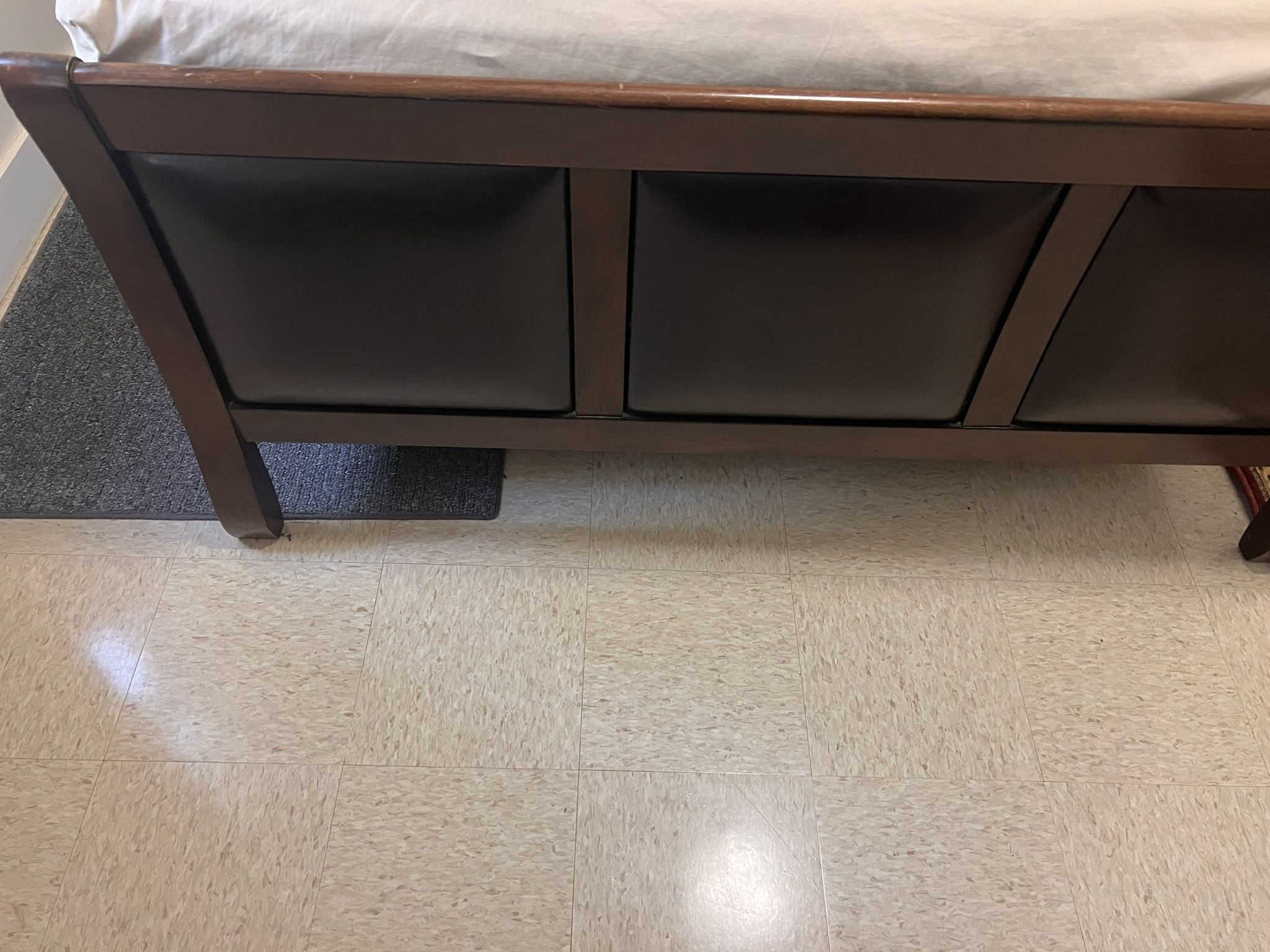 Clean queen size bed without mattress