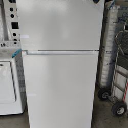 brand new top and bottom Madea refrigerator with freezer great only 450.00