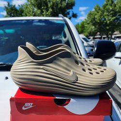 Nike Size 10  Reactx Rejuven8 khaki