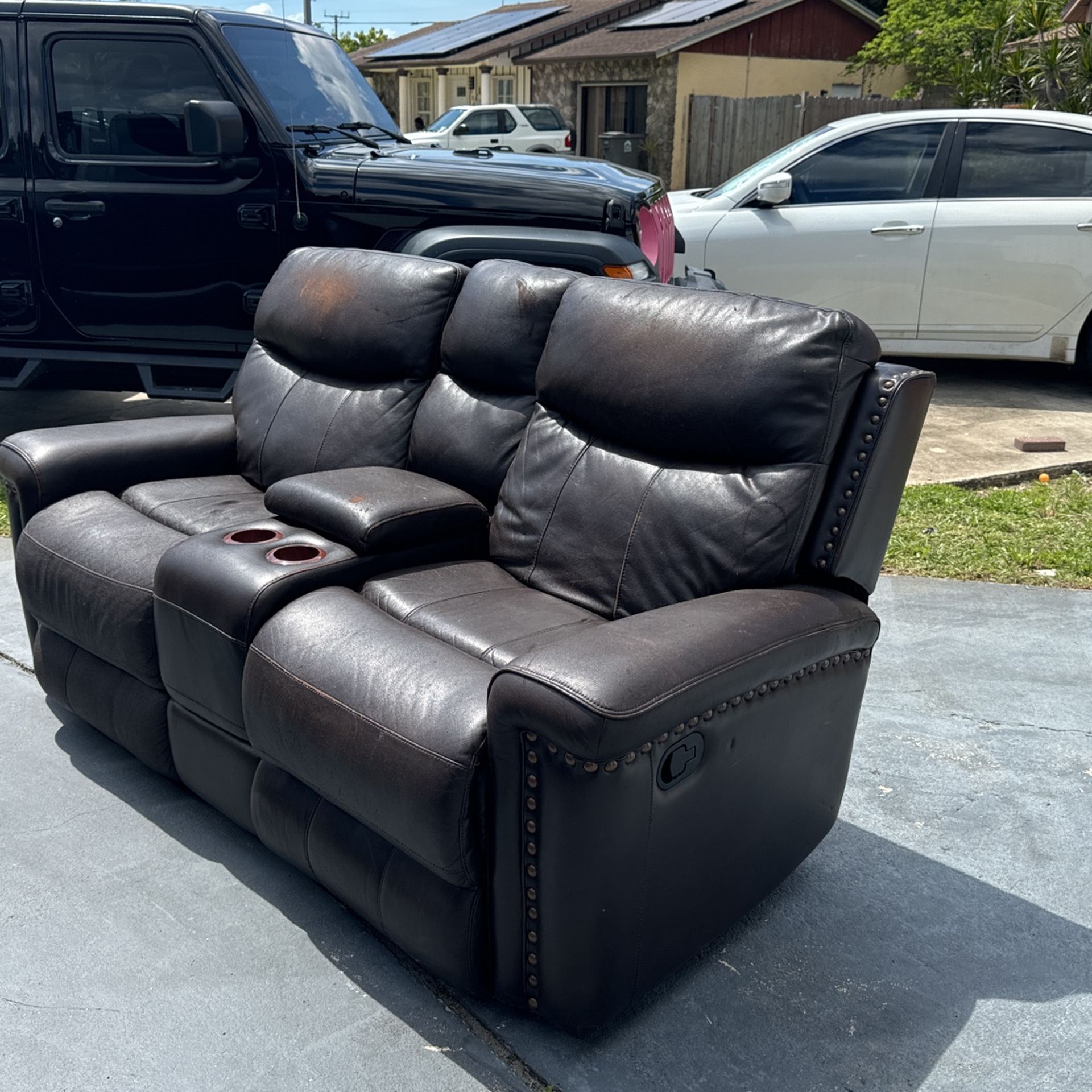 Brown Reclining Sofa