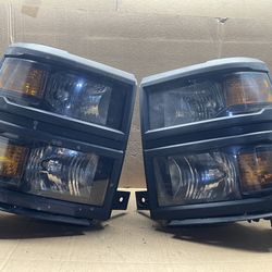 #OH184 OEM 2014-2015 CHEVY SILVERADO 1500 BLACK HEADLIGHT PAIR