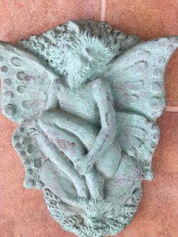 Ceramic Fairy. (Glued wing ).