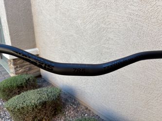 New Sixpack Millenium 785 mm wide by 31.8 handlebar with new Grips