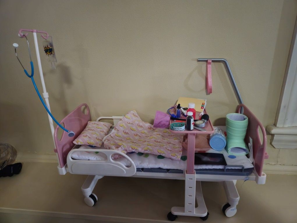 Our Generation Adjustable Hospital Bed & Doctor Set, Martha Doll, and “Calling 9-1-1” Book, & Heals on Wheels Wheelchair Accessory Set