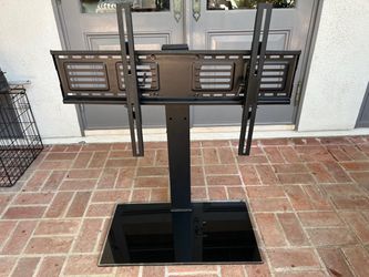 FITUEYES Large Table Top Swivel TV Stand-Fits up to 50” Television