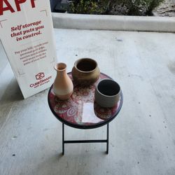 A crate full of flower pots
