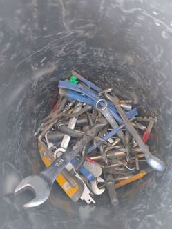 Tools and tie downs for a tent