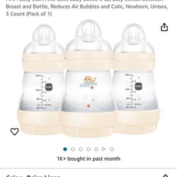 Set Of Three Baby Bottles