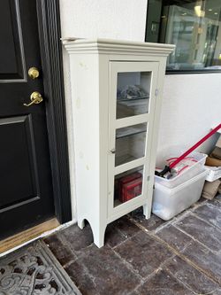 Freestanding Cabinet With Glass Shelves