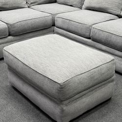 Jeromes Gray Sectional Couch with ottoman, deep cleaned. We deliver & setup.