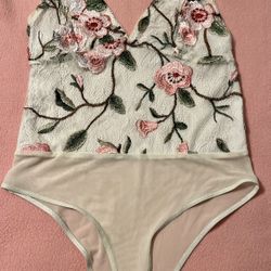 White lace bodysuit w/ pink flowers