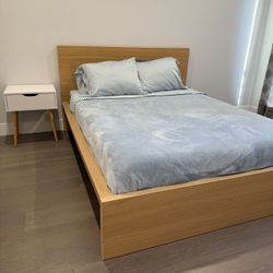 Queen Bed, Mattress. Desk, Lamp, And Linens