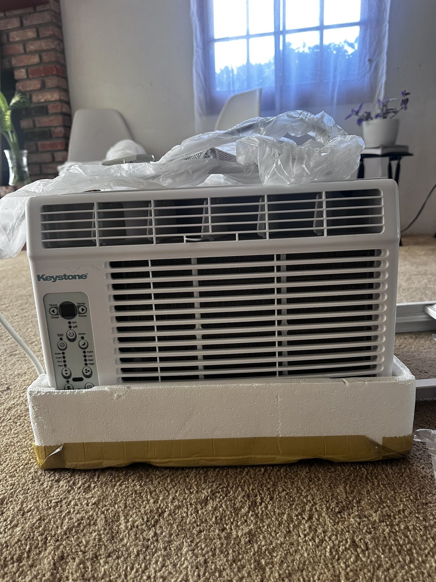 Brand New Ac in the Box / Never Used / Including Remote Control and universal window support !