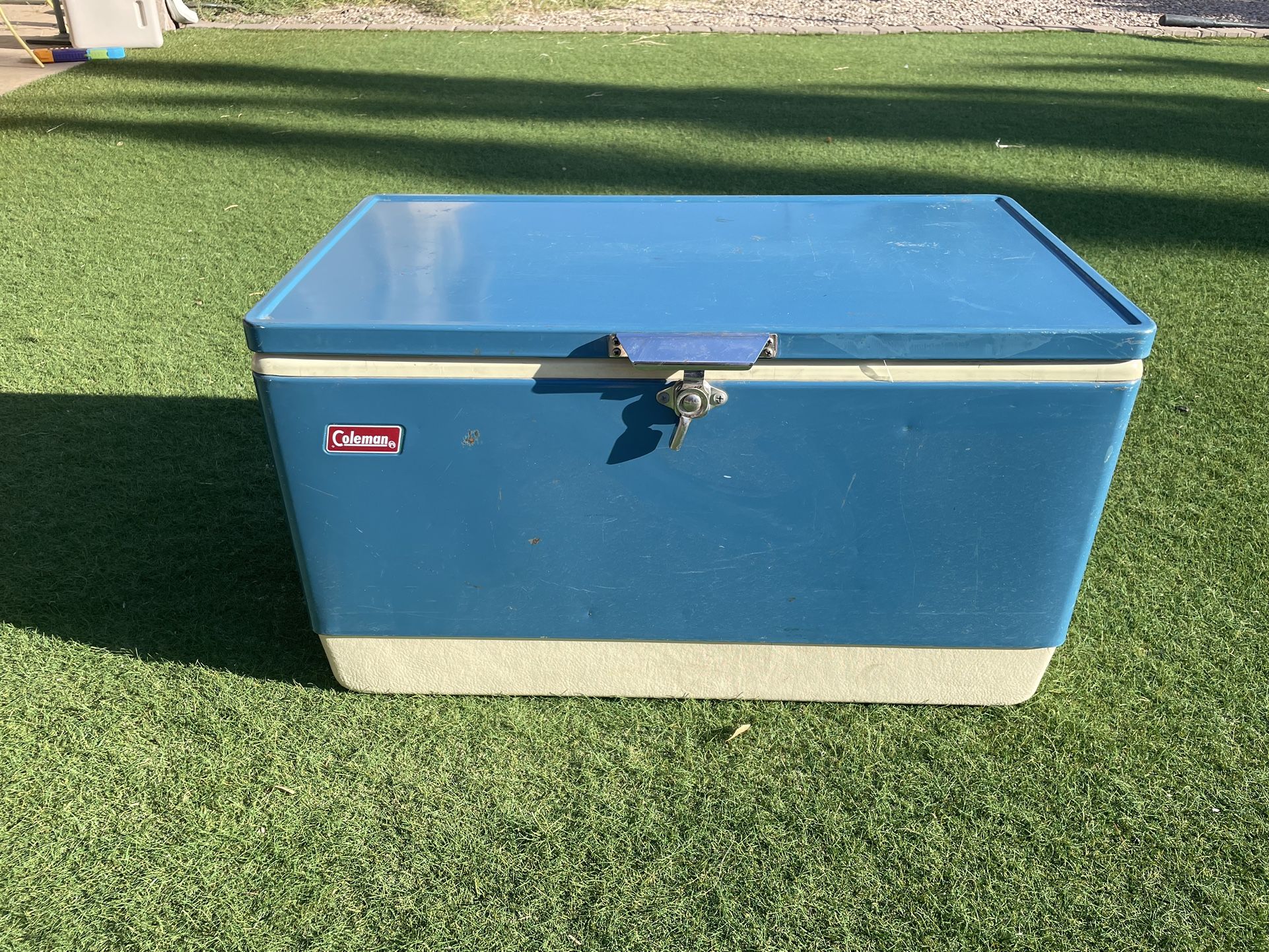 1970's Coleman Blue Snow Lite Cooler. Cooler is in great condition for its age. Very little rust no cracks inside or out. Small crease on front and