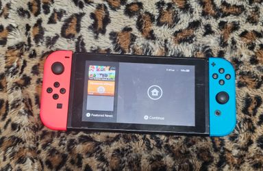 Nintendo Switch V1 HAC-001 + Red/Blue Joy-Cons