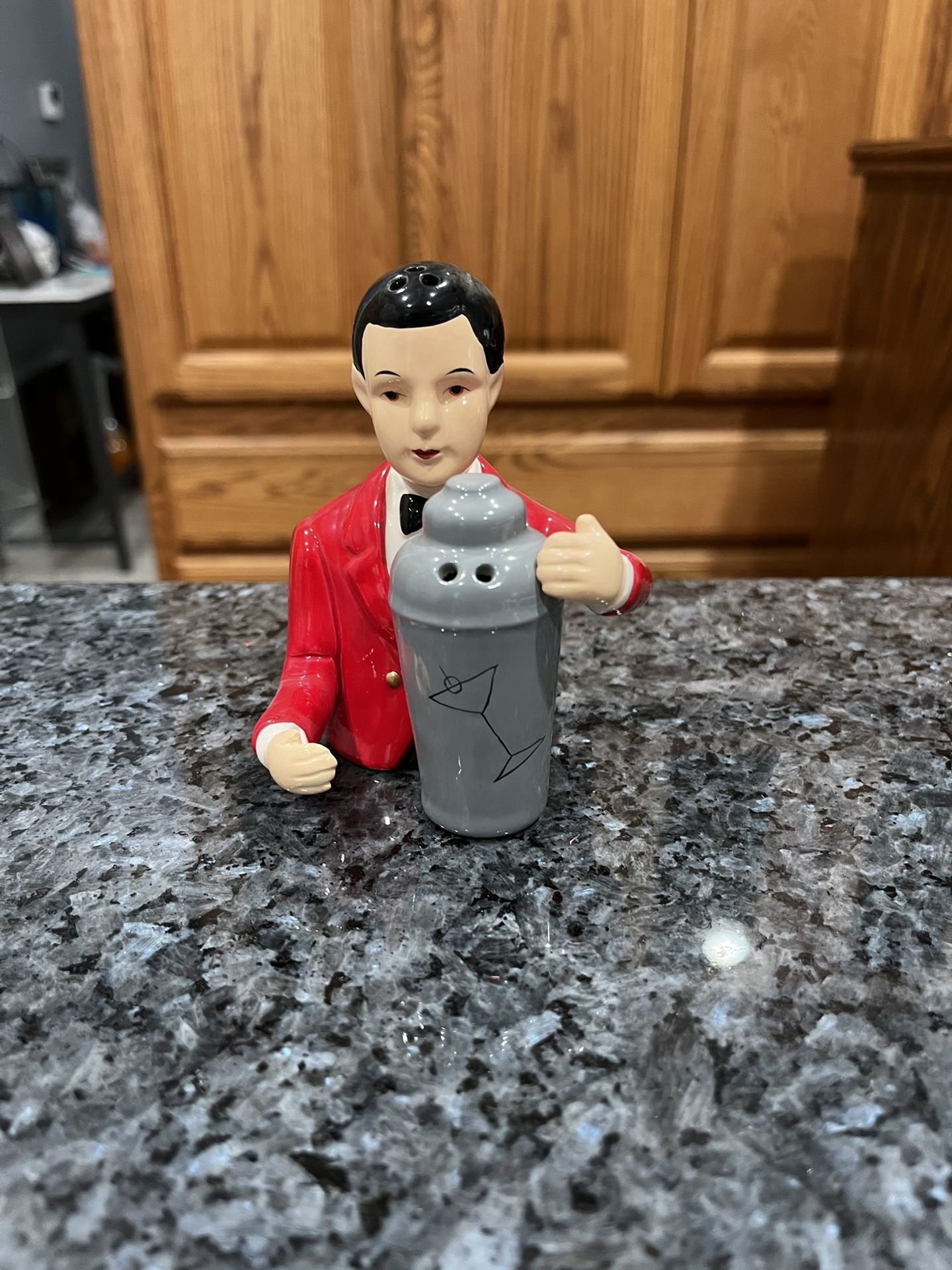 Vintage Ceramic Waiter with a bottle of champagne pair of Salt and Pepper Shakers.  Size approximately 4 inches tall.  Brand new never used.  
