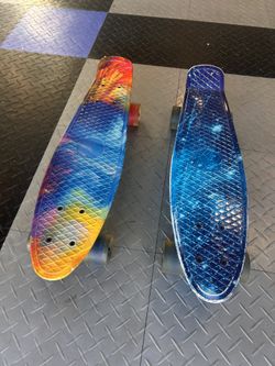 Two 22” Penny Skateboards