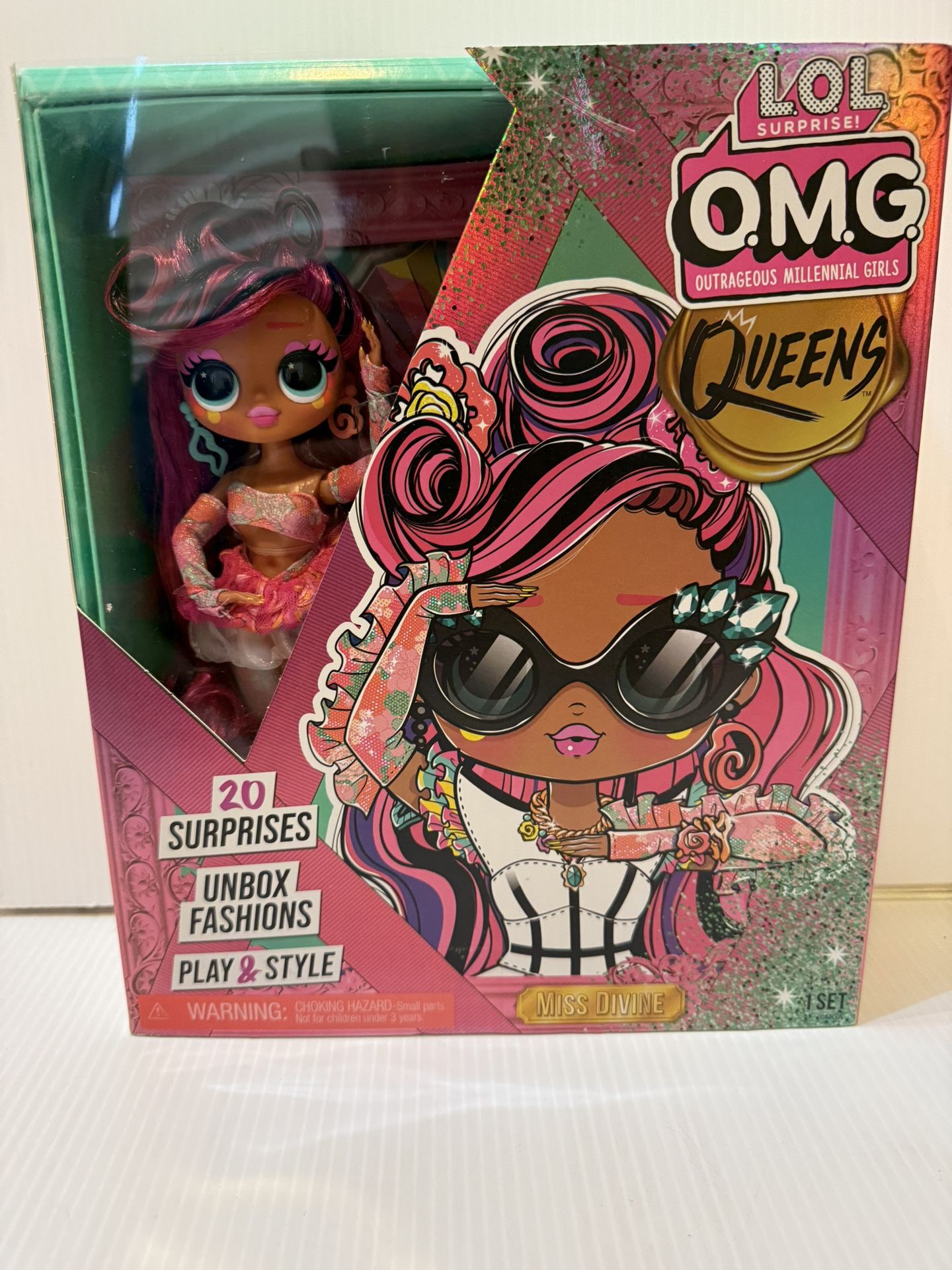 LOL Surprise OMG Queens Miss Divine fashion doll with 20 Surprises