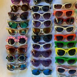 New sunglasses. See all pictures. Brand names. Prices from one dollar to five dollars.