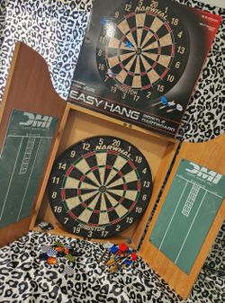 Dartboard And Cupboard And Darts