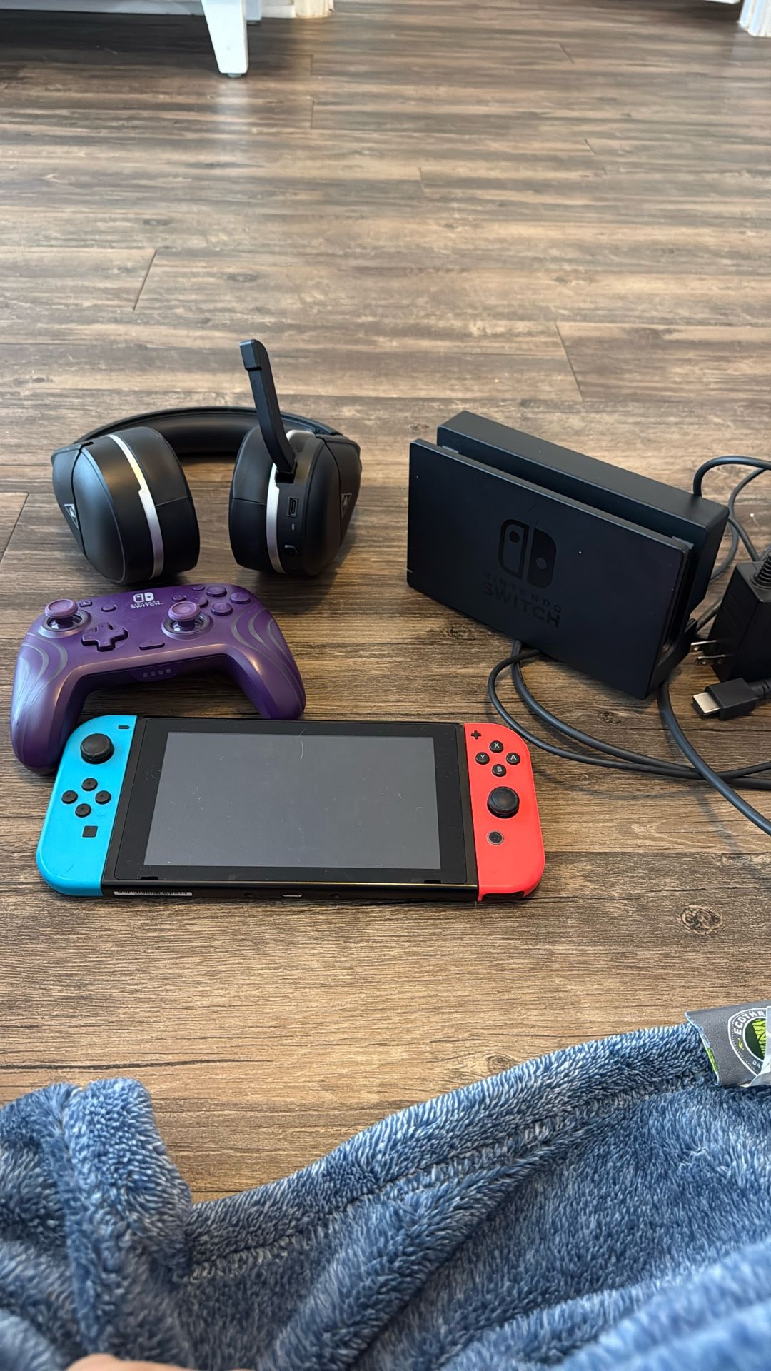 Nintendo Switch 1 with Gaming Accessories (extra controller, headphones, tv stand, and charger)