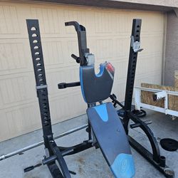 WEIGHT BENCH AND SQUAT RACK AND WEIGHTS 