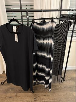 1 Women’s black short dress & 1 brown long  maxi sun dress & 2 long maxi skirts XL