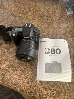 Nikon D80 with 18-135mm lens and Tamarac bag