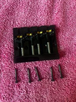 Hipshot bass bridge - 4 string black