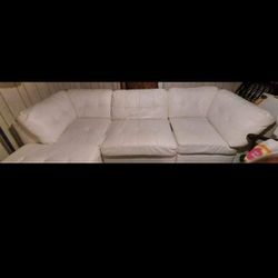 White Sectional & Ottoman.   Delivery possible